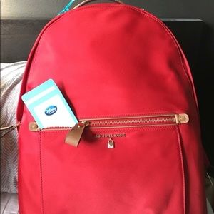 Large Kelsey Michael Kors backpack in red